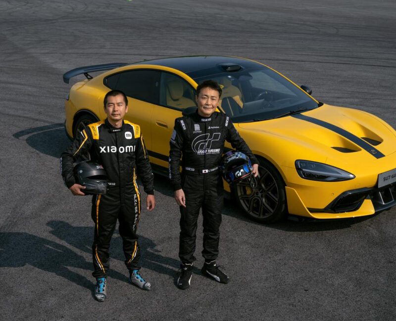 Kazunori Yamauchi i Lei Jun